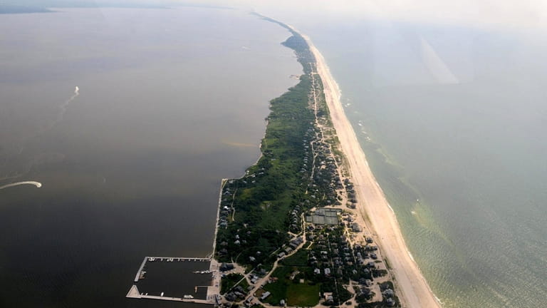 Some Fire Island homeowners have elevated their houses as much...