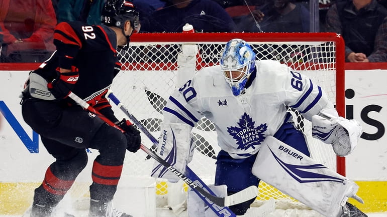 Toronto Maple Leafs goaltender Joseph Woll (60) blocks the shot...