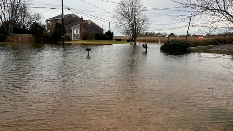 Flooding near the corner of Shields Court and Bellhaven Road in Brookhaven...