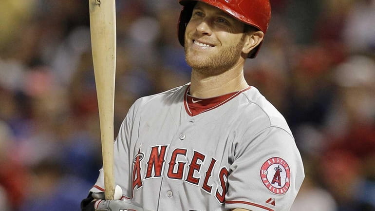 Josh Hamilton of the Los Angeles Angels smiles as the...