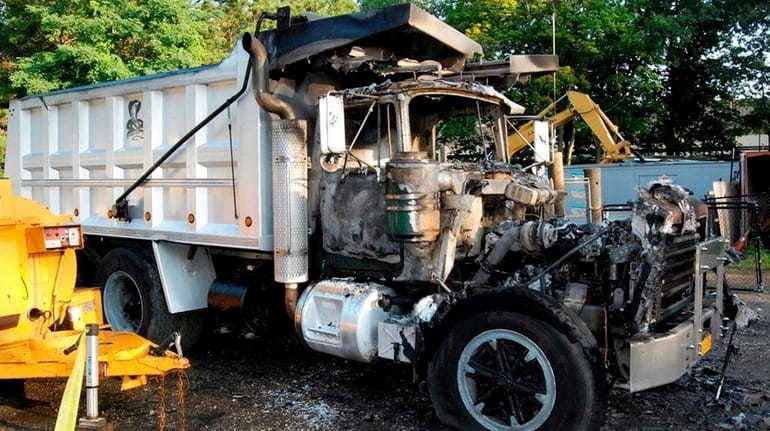 A truck that was torched in Riverhead on Aug. 10,...