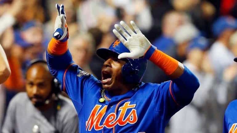 Yoenis Cespedes #52 of the New York Mets celebrates his...