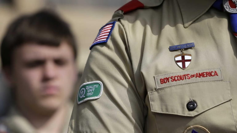 The Boy Scouts uniform fashioned with an Quality patch is...