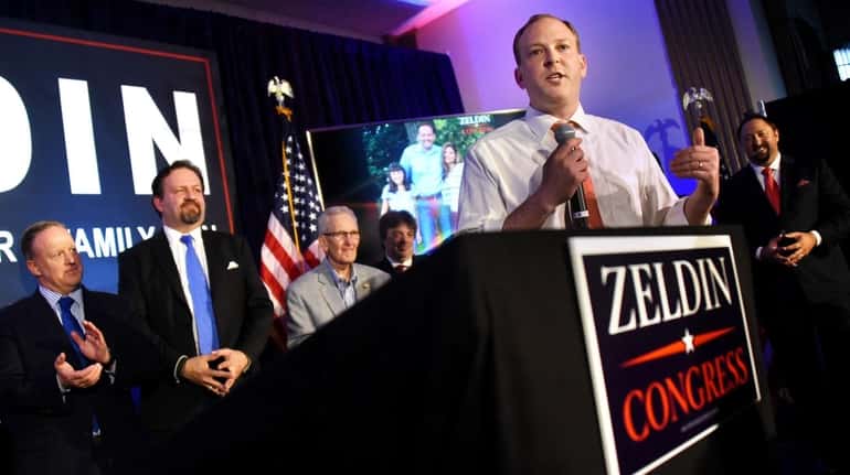 Republican supporters of Lee Zeldin, center, kicked off his campaign...
