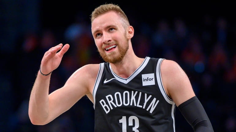 The Nets' Dzanan Musa reacts after a three-pointer during a...