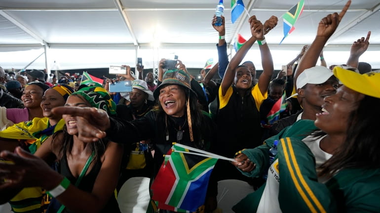 People attend Freedom Day celebrations in Pretoria, South Africa, Saturday...