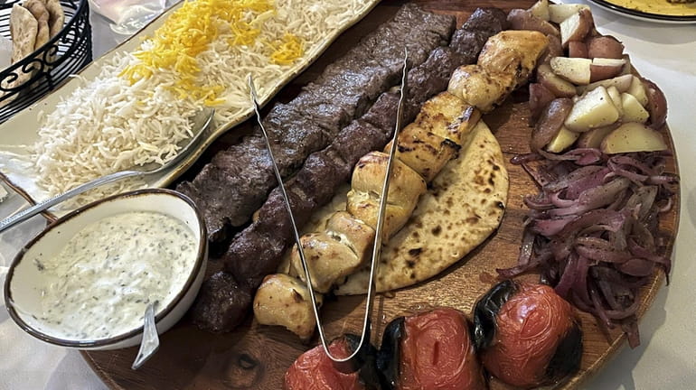 The mixed grill with a lamb koobideh, barg steak and...