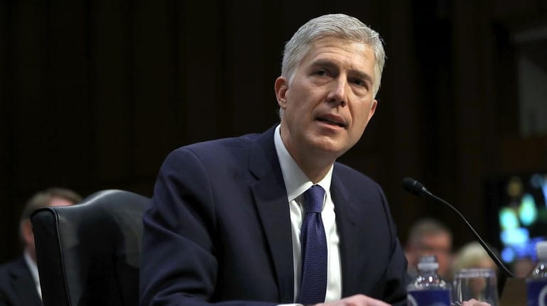 Judge Neil Gorsuch speaks during the first day of his...