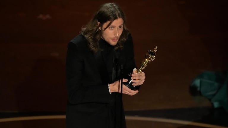 Ludwig Goransson accepts the award for best original score for...