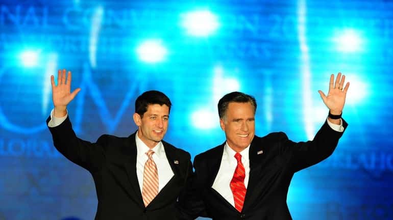 Republican Presidential candidate Mitt Romney, right and his vice presidential...