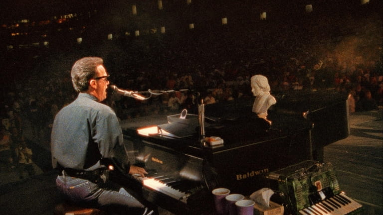 Billy Joel performing at Yankee Stadium in 1990.



	 