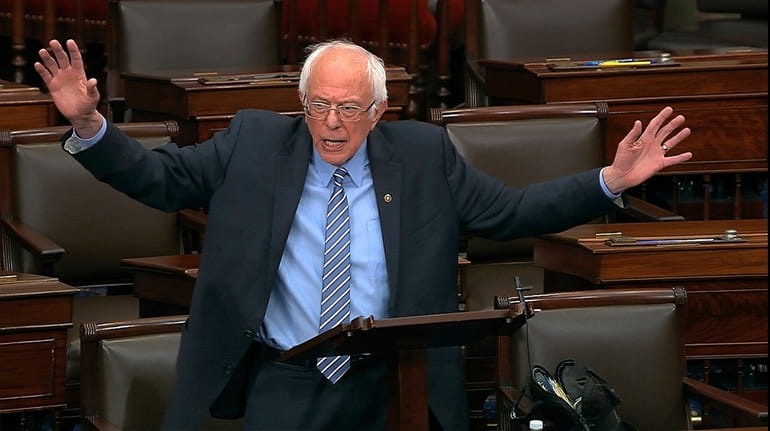 Sen. Bernie Sanders, I-Vt., speaks on the Senate floor at...