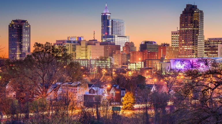 The skyline of Raleigh, N.C. Cheap fares from MacArthur airport make...