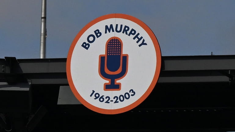 A sign at Citi Field honors former Mets broadcaster Bob...