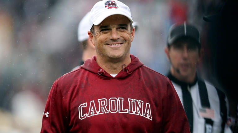 South Carolina head coach Shane Beamer is all smiles after...