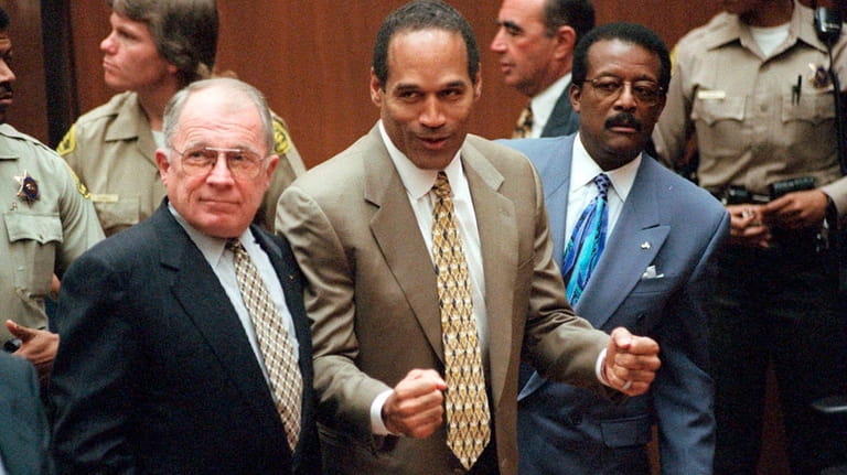 In this Oct. 3, 1995, file photo, O.J. Simpson reacts...