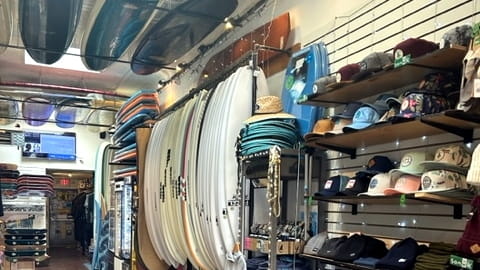 Moku Surf Shop in Long Beach sells skate and surfboards,...