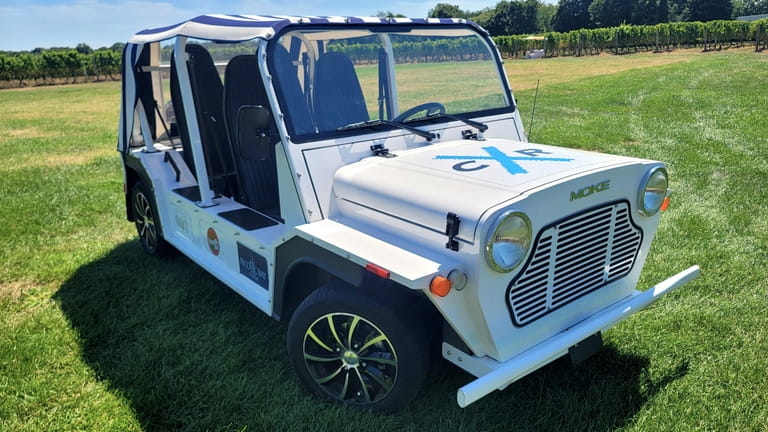 This Moke electric car is used to provide tours to...