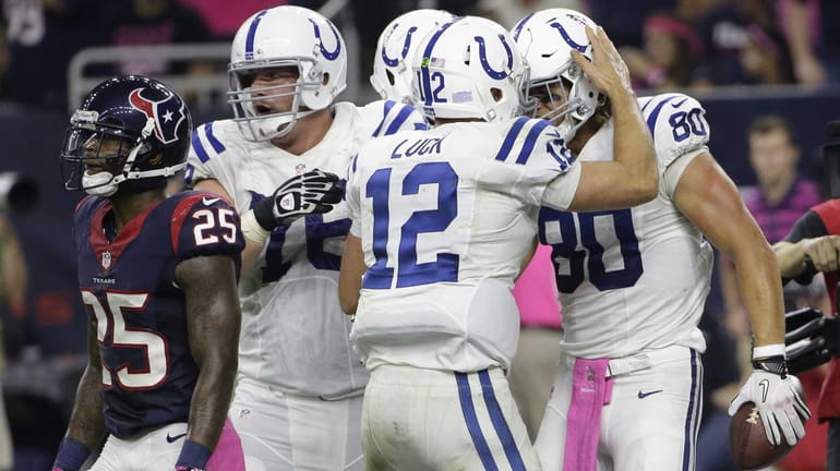 Indianapolis Colts' Andrew Luck celebrates with Coby Fleener after they...