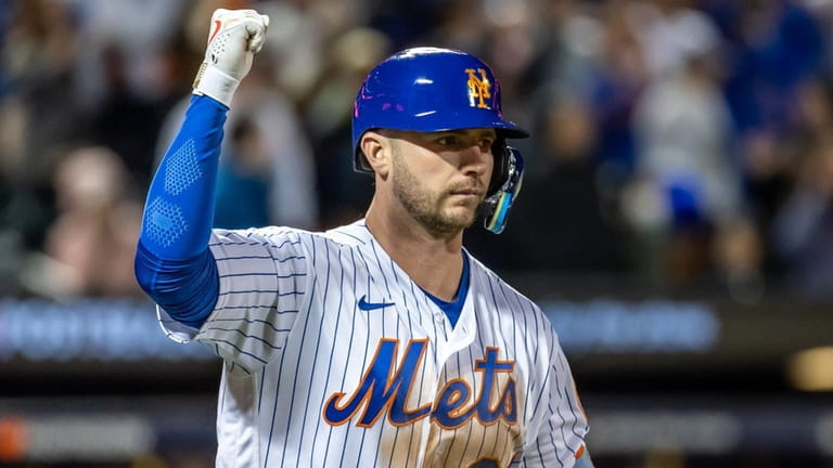 The Mets' Pete Alonso  reacts during a game against the Padres...