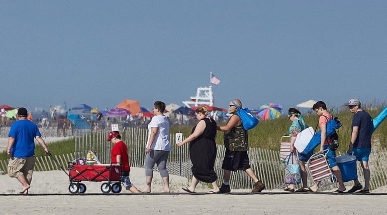 People arrive at Jones Beach in Wantagh on May 29,...