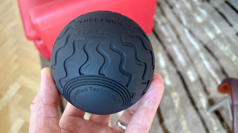 Theragun Wave Solo vibrating massage ball is about the size...