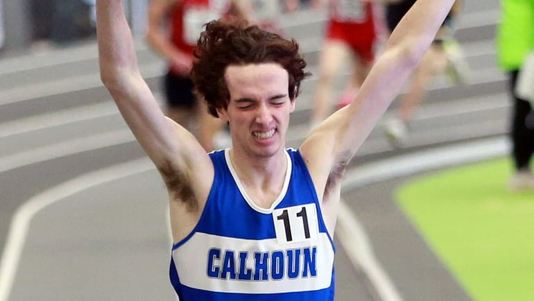 Logan Schaeffler of Calhoun wins the boys 1,600-meter run in...