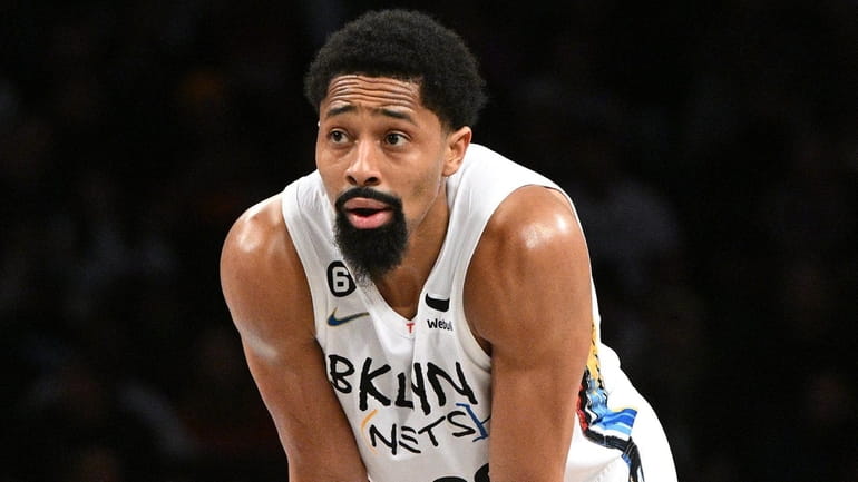 Nets guard Spencer Dinwiddie looks on against the Heat in...
