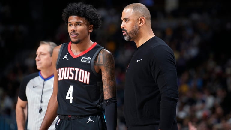 Houston Rockets coach Ime Udoka, right, confers with guard Jalen...