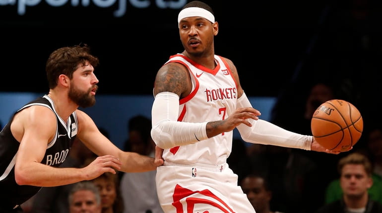 Carmelo Anthony  of the Houston Rockets controls the ball during...