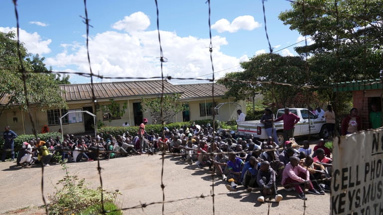 Prisoners gather inside Chikurubi Maximum prison before their release on...