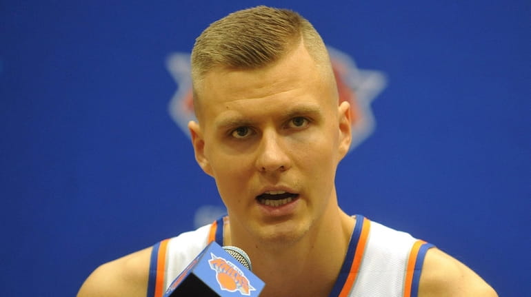 Knicks forward Kristaps Porzingis fields questions during the team's media day...