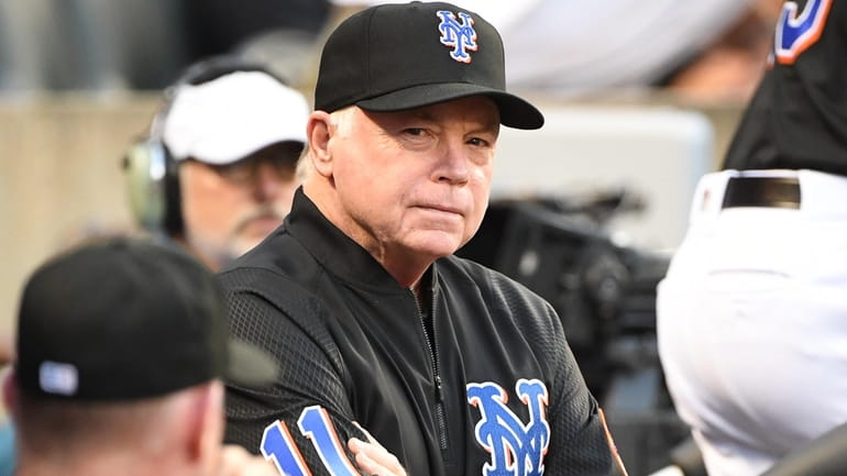 Mets manager Buck Showalter looks on from the dugout during...