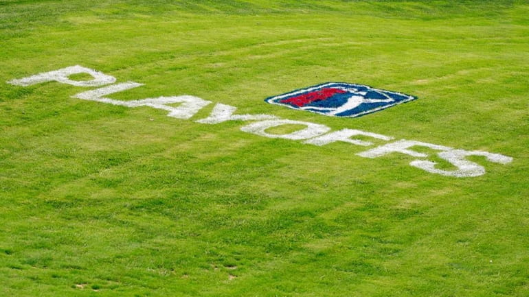 A detail of a PGA Playoffs logo is seen painted...