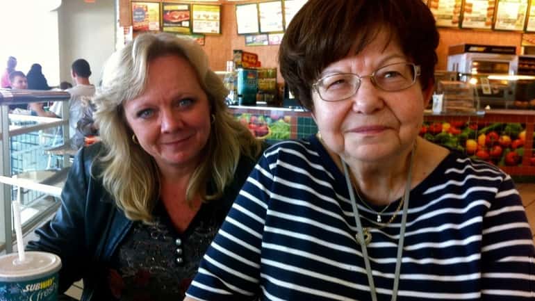 Levittown's Patti Brownstone, 51, left, has lunch with her mother-in-law,...