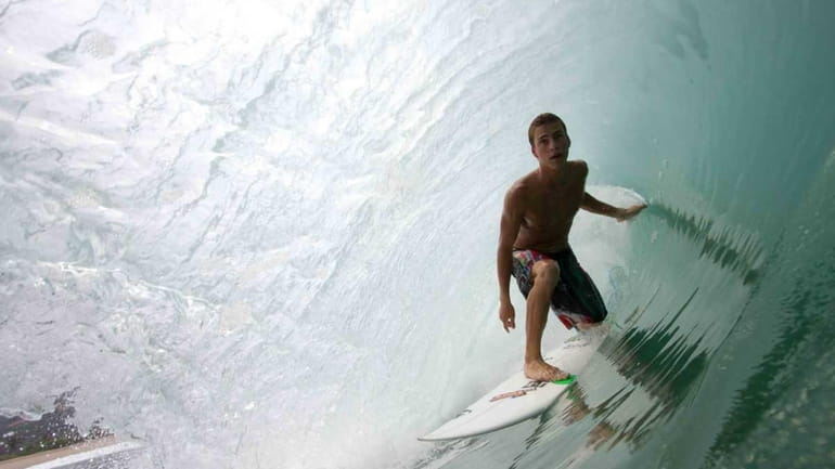 Long Beach native and pro surfer Balaram Stack rides the...