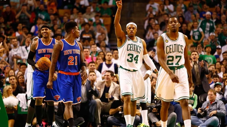 Boston Celtics forward Paul Pierce celebrates and gestures after a...