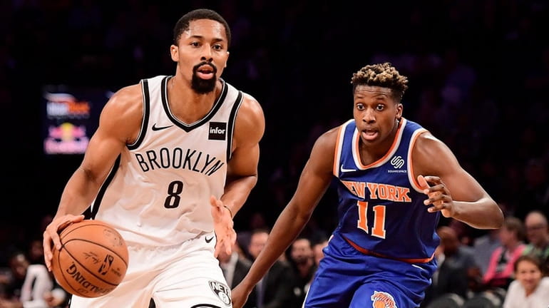 The Nets' Spencer Dinwiddie is defended by the Knicks' Frank Ntilikina...