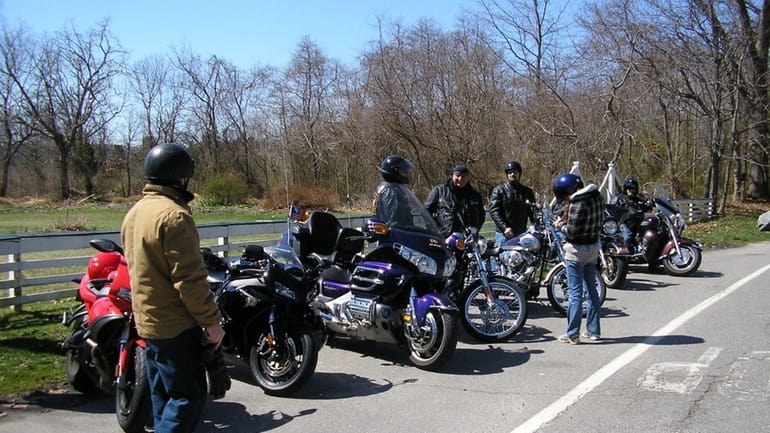 Members of the Nassau Wings Motorcycle Club take a break...