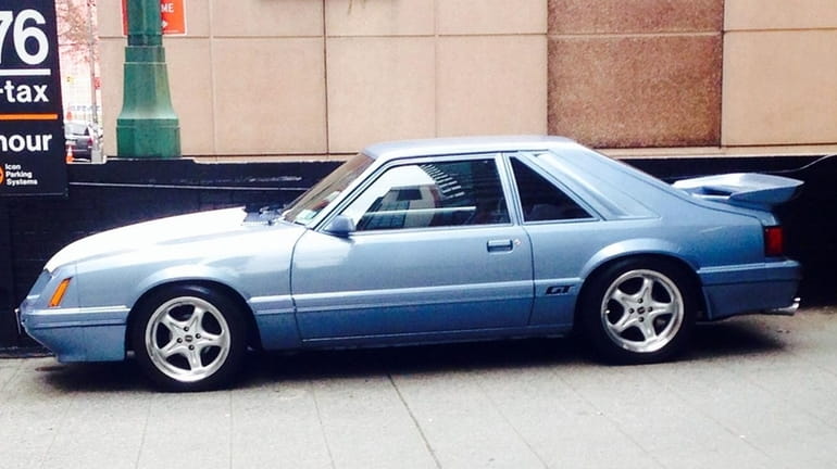 This 1986 Ford Mustang GT owned by Louis Pena is...
