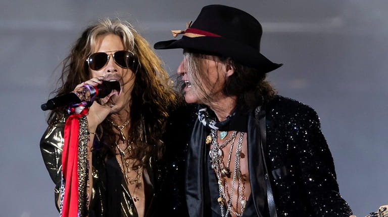 Steven Tyler, left, and Joe Perry, of Aerosmith, performing in...