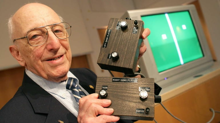 Ralph Baer, a video game pioneer who created both the...