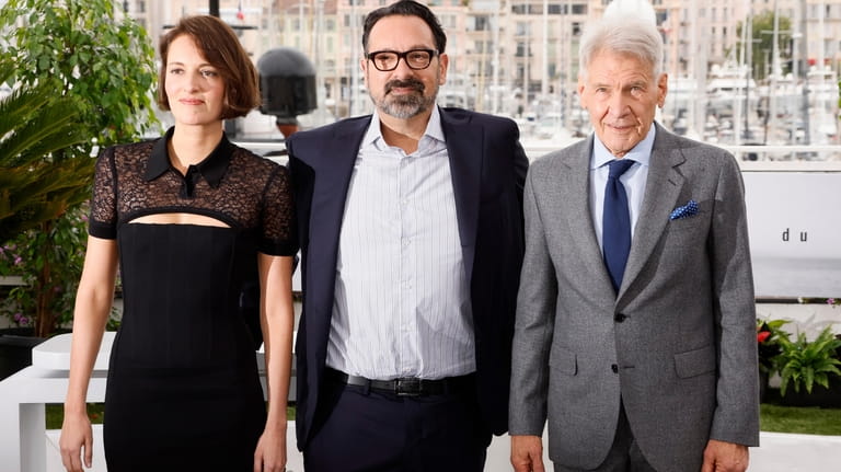 Phoebe Waller-Bridge, from left, director James Mangold, and Harrison Ford...