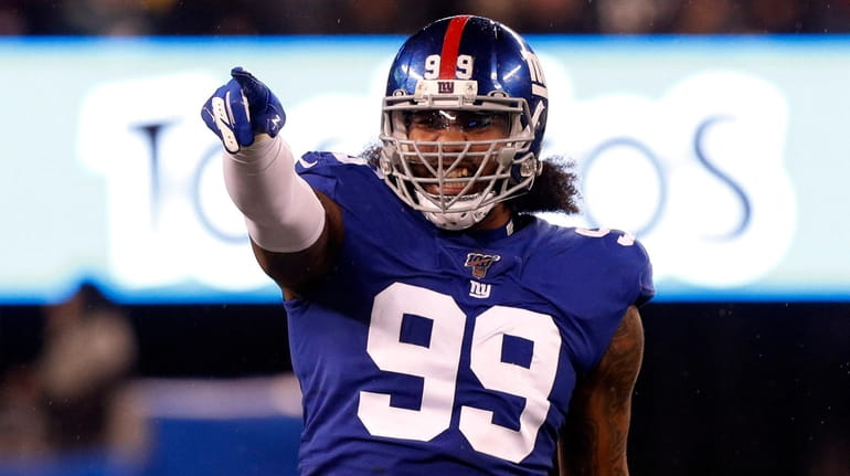 Leonard Williams of the Giants reacts after his sack in...