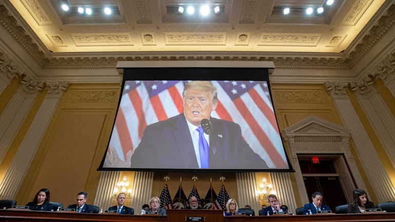 Former President Donald Trump is shown on video as the Jan....