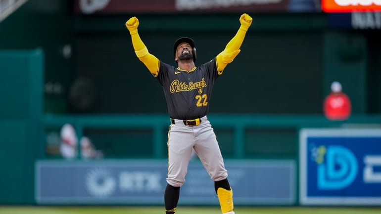 Pittsburgh Pirates designated hitter Andrew McCutchen celebrates his double during...