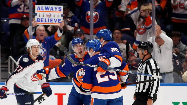 Jean-Gabriel Pageau #44 of the New York Islanders celebrates his...