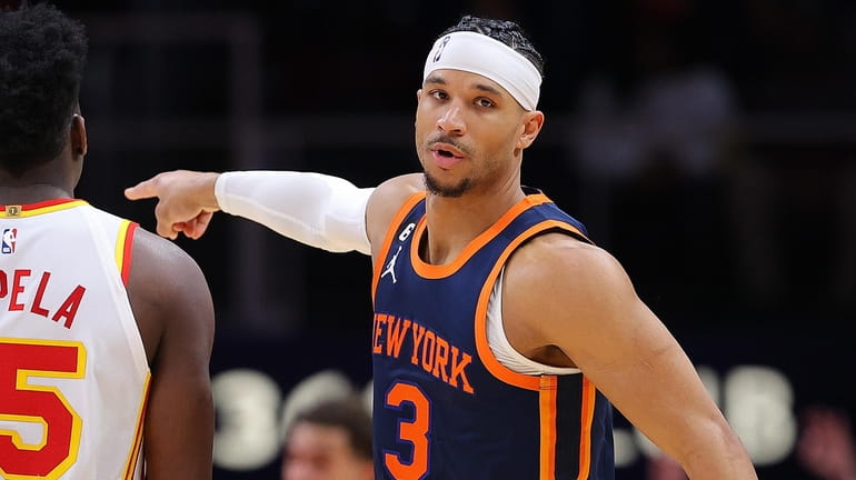 Josh Hart #3 of the Knicks reacts after hitting a...