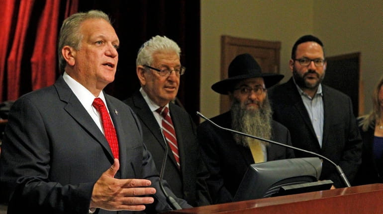 Nassau County Executive Edward Mangano joins with religious leaders in...