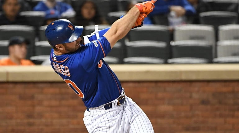 New York Mets first baseman Pete Alonso hits a solo...